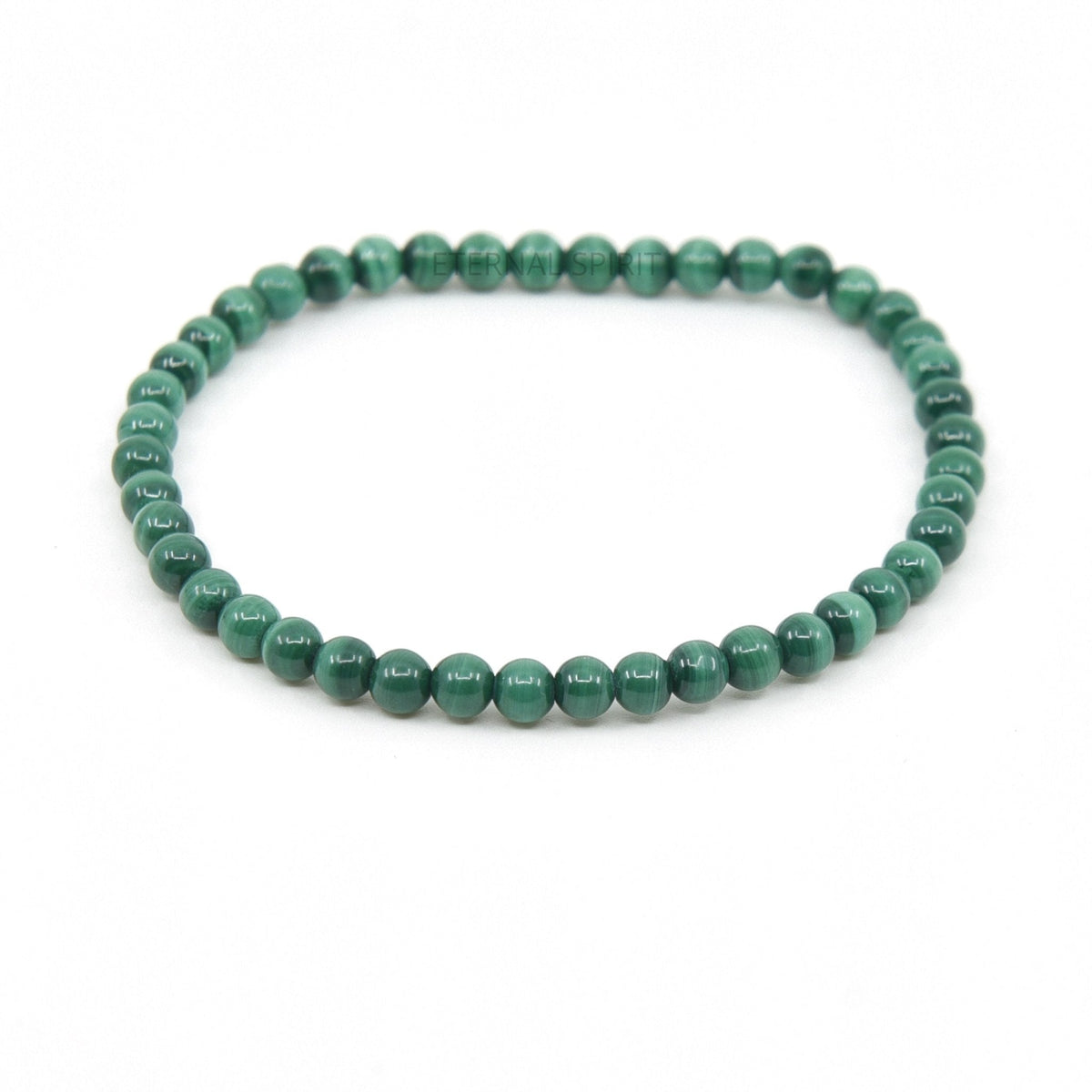 polished Malachite 4mm round bead bracelet on white background — Eternal Spirit