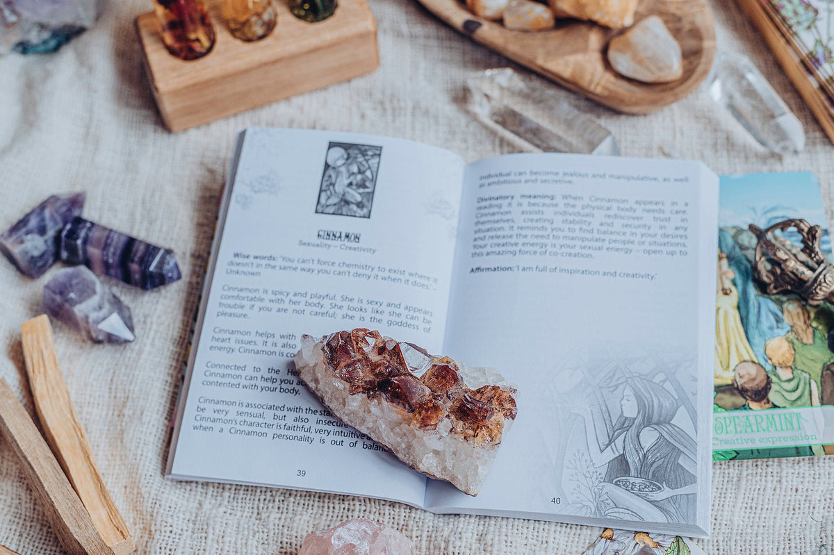 Oracle Of The Essences deck, Spread of essence cards showing crystal bottles and nature illustrations — Eternal Spirit