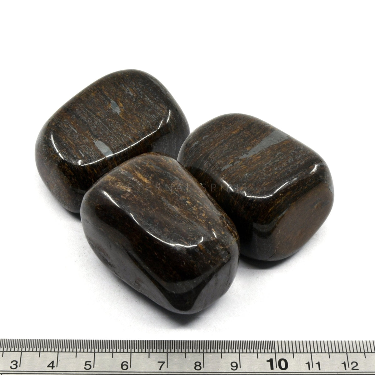 close-up of extra-large Bronzite tumbles showing natural colour and lustre — Eternal Spirit