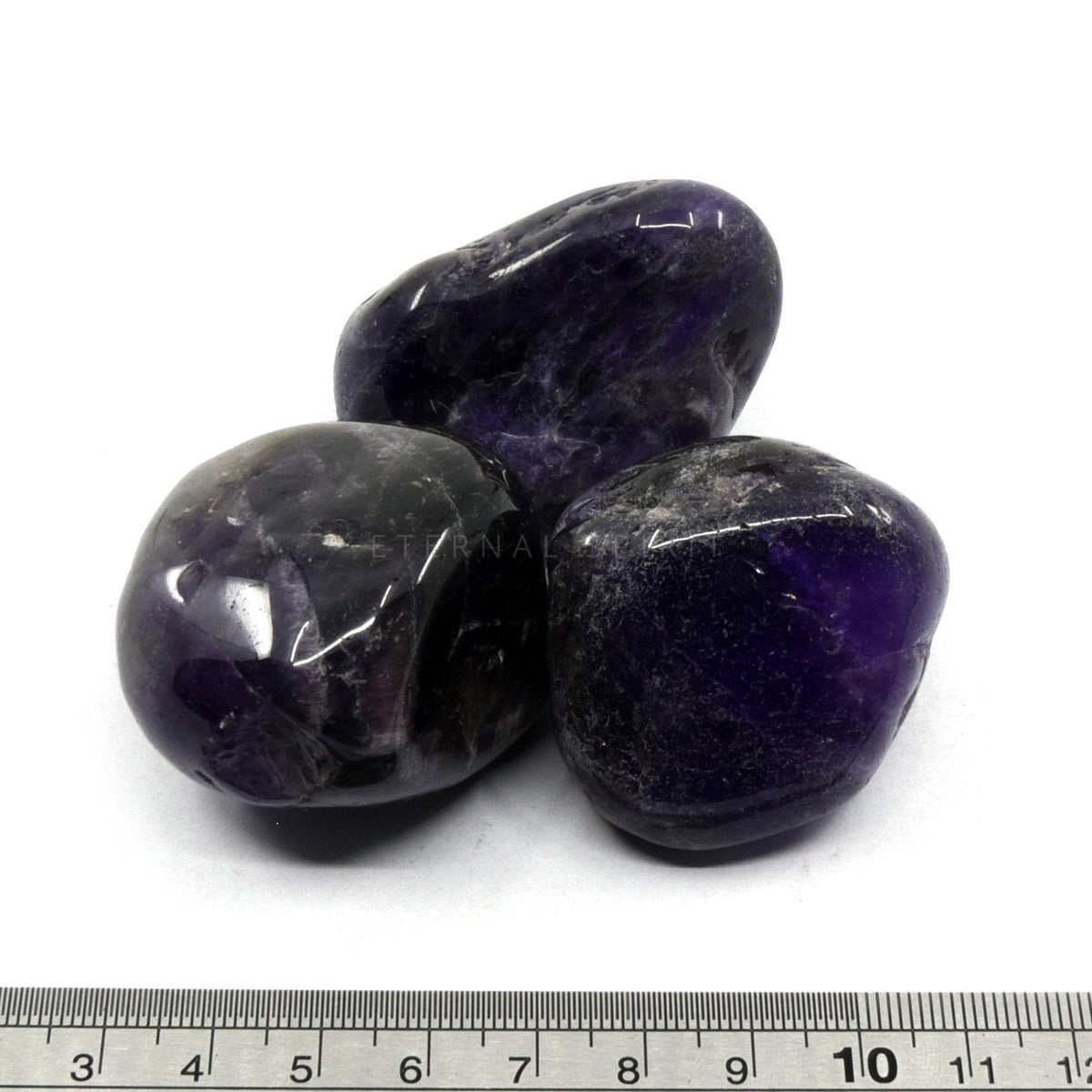 close-up of extra-large Amethyst (Chevron) tumbles showing natural colour and lustre — Eternal Spirit
