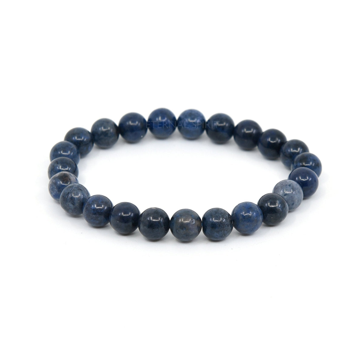 polished Dumortierite 8mm round bead bracelet on white background — Eternal Spirit