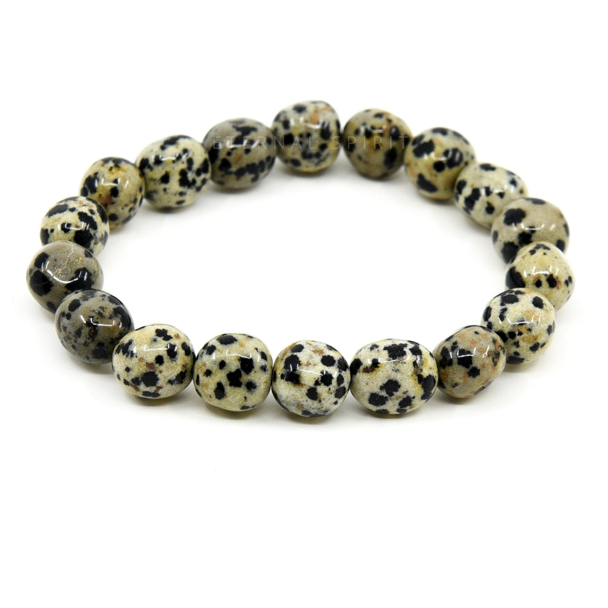 polished Dalmatian Stone tumbled round bead bracelet on white background — Eternal Spirit