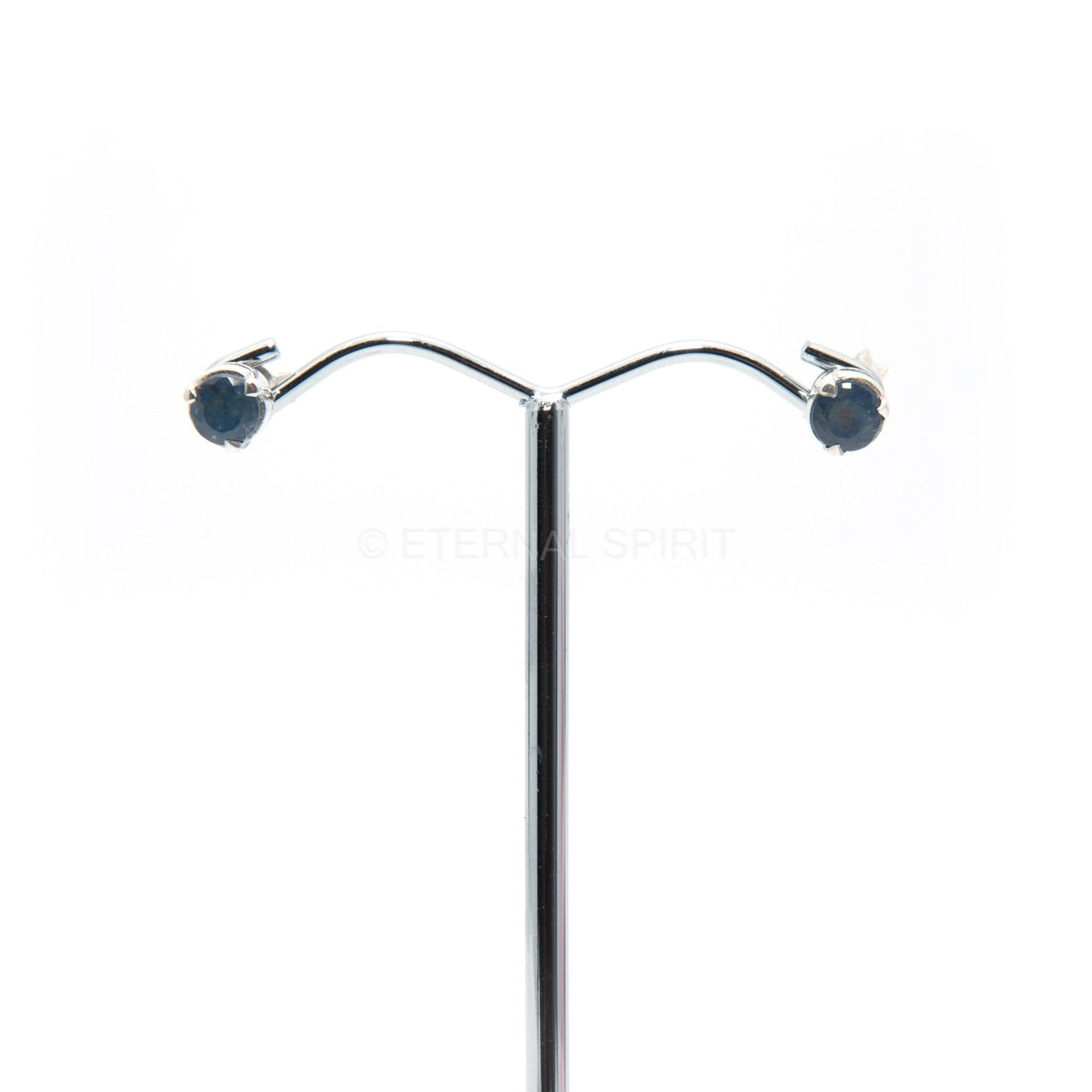 sapphire (blue) faceted circle earrings with silver setting on white background — Eternal Spirit