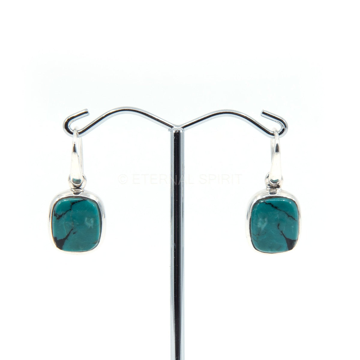 turquoise cabochon rectangle earrings with silver setting on white background — Eternal Spirit
