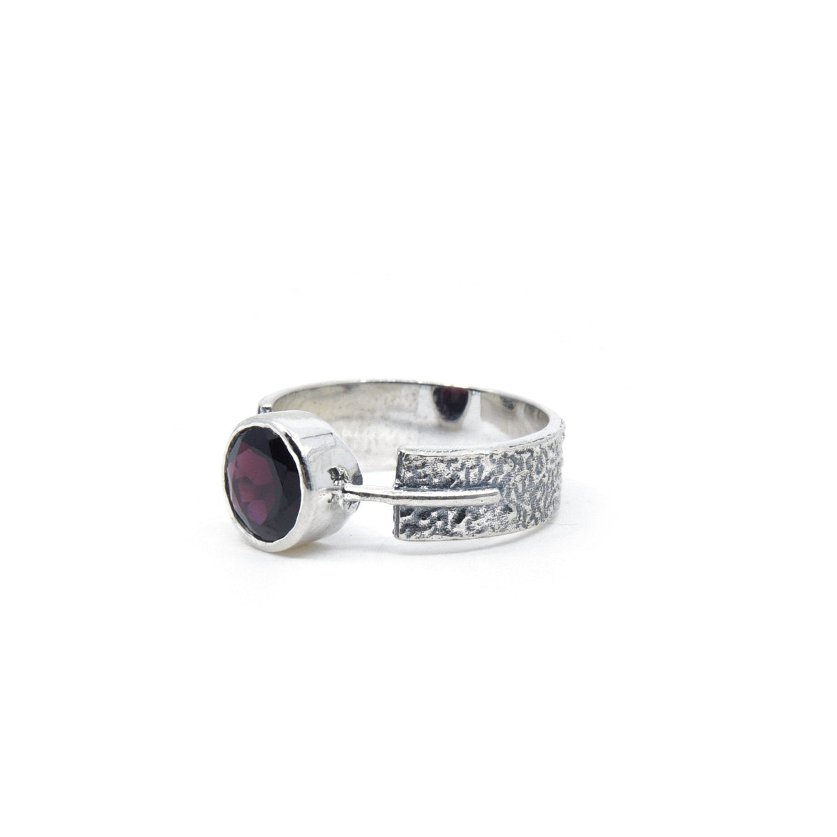 elegant side profile of Garnet ring #R498, the gemstone catching light — Eternal Spirit
