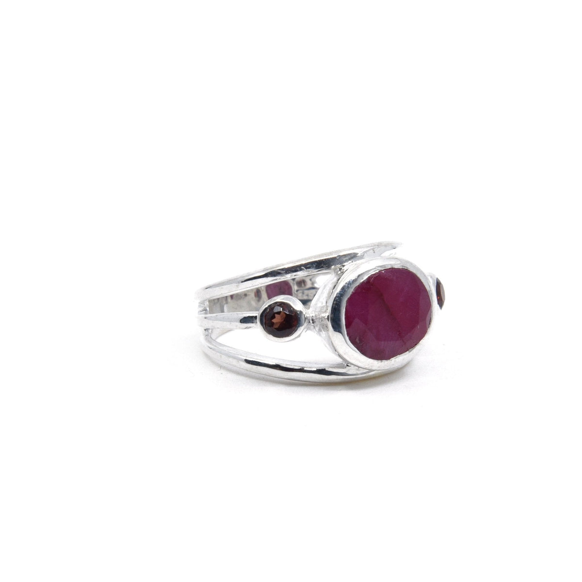 elegant side profile of Ruby ring #R551, the gemstone catching light — Eternal Spirit
