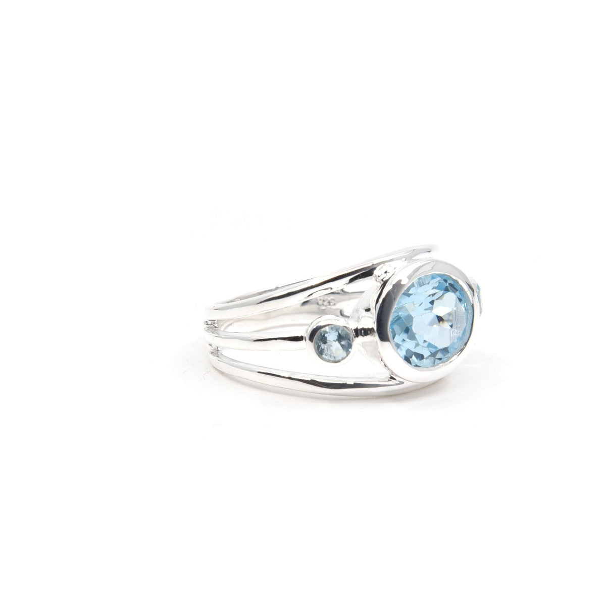 Topaz (Blue) ring #R554 angled to reveal its polished setting and silver band — Eternal Spirit