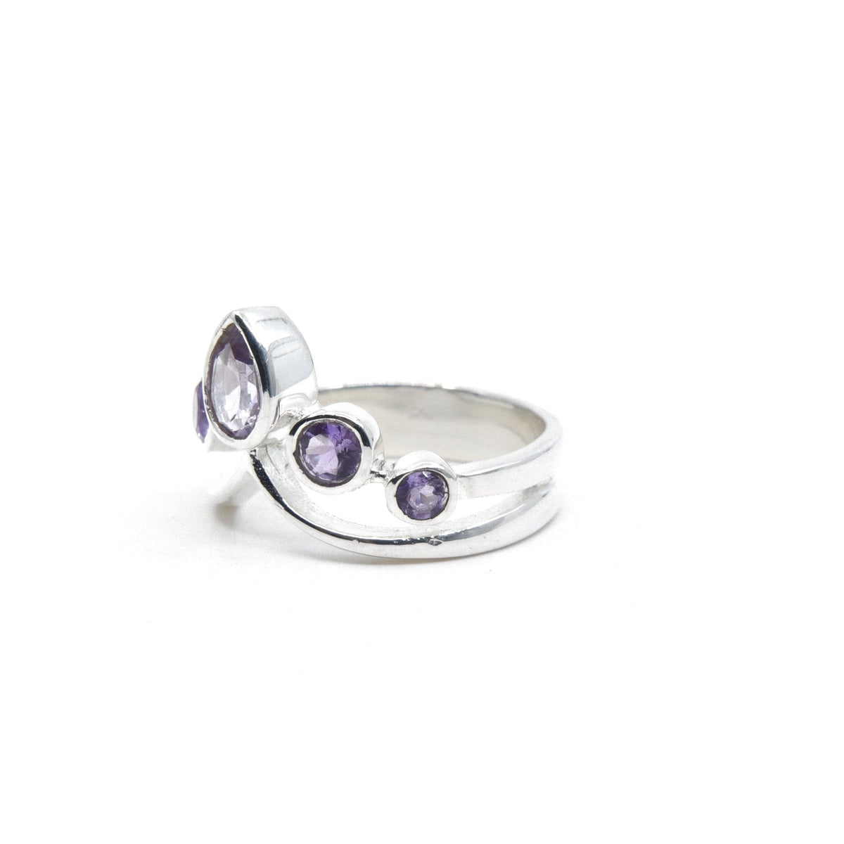 elegant side profile of Amethyst ring #R559, the gemstone catching light — Eternal Spirit