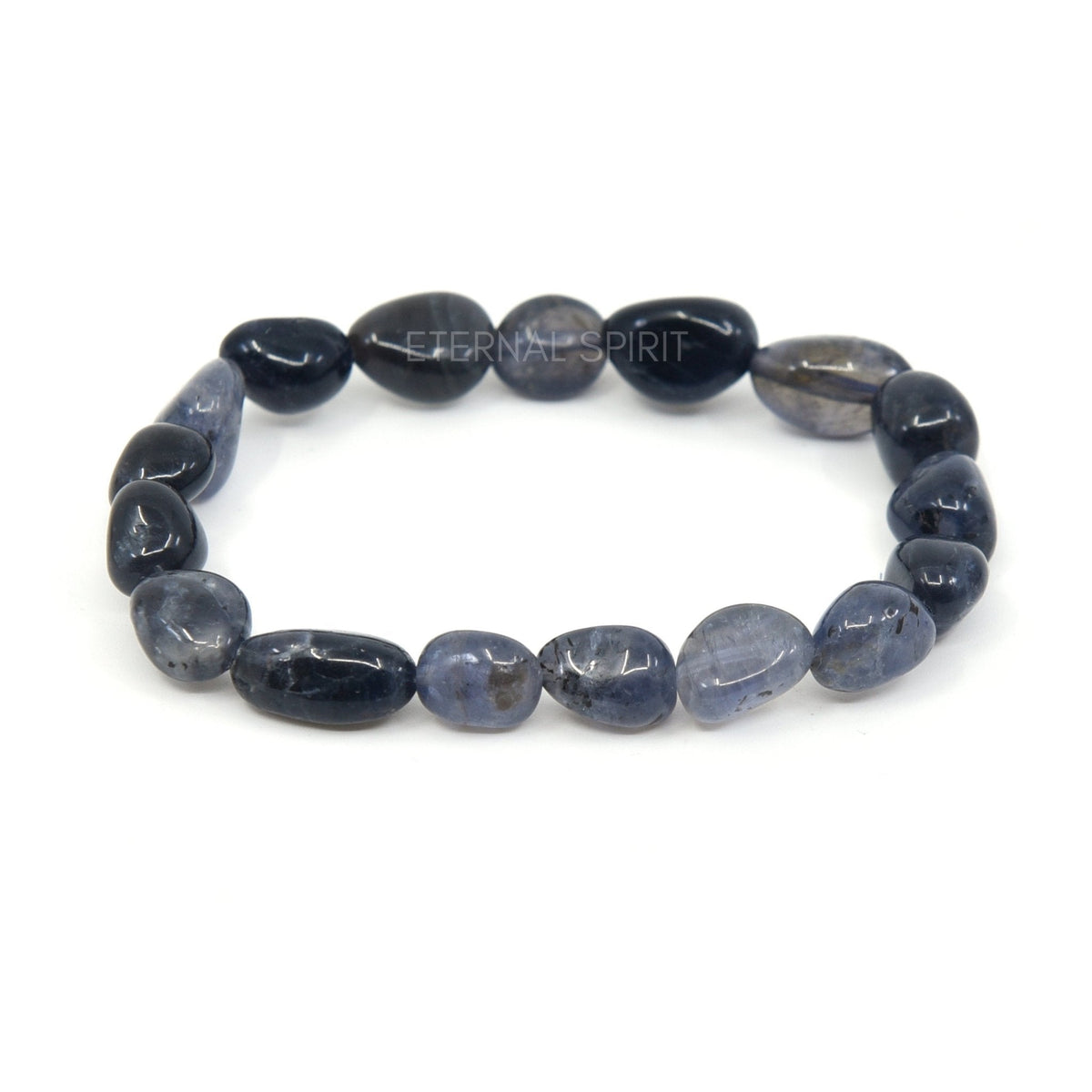 polished Iolite tumbled round bead bracelet on white background — Eternal Spirit