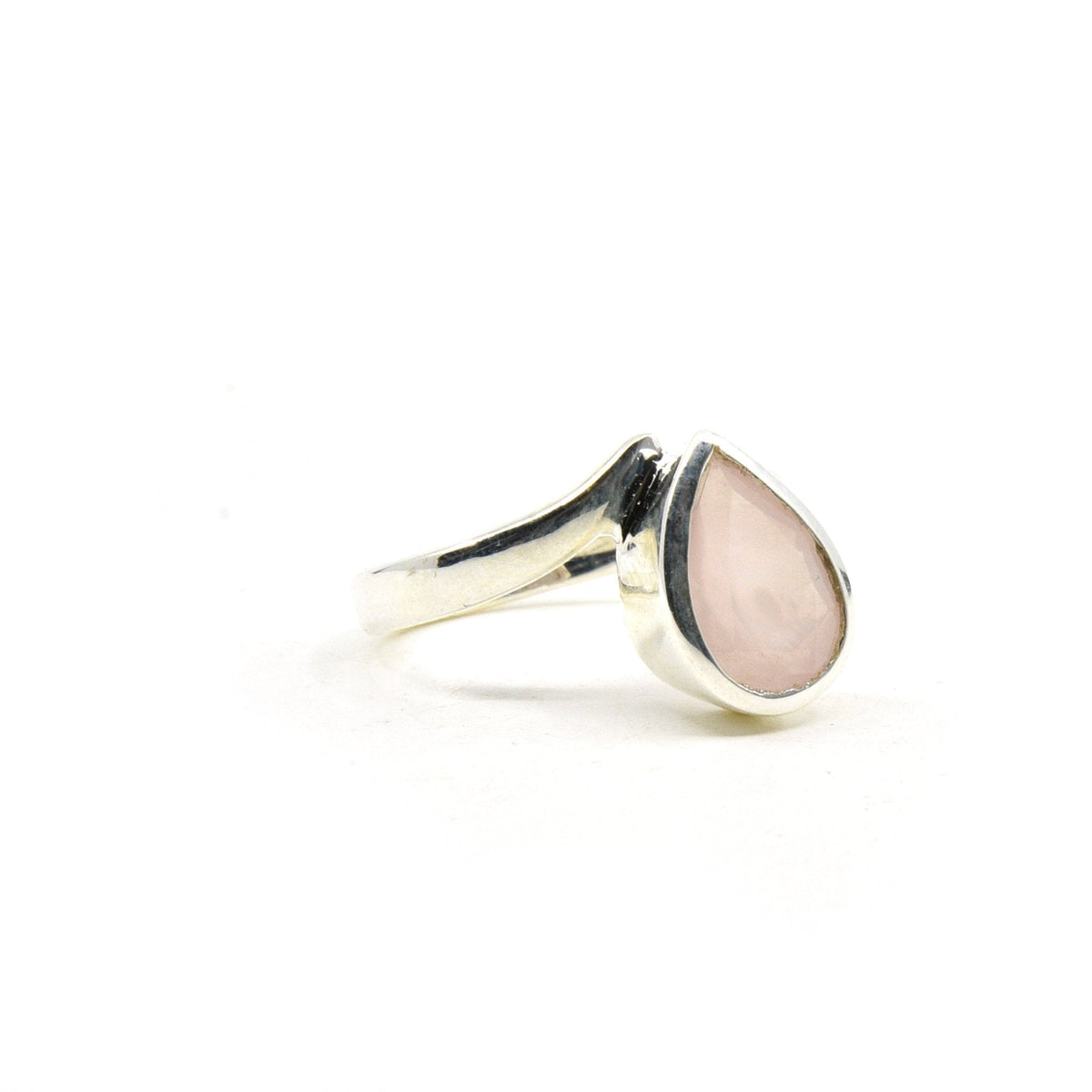 Quartz (Rose) ring #R689 angled to reveal its polished setting and silver band — Eternal Spirit