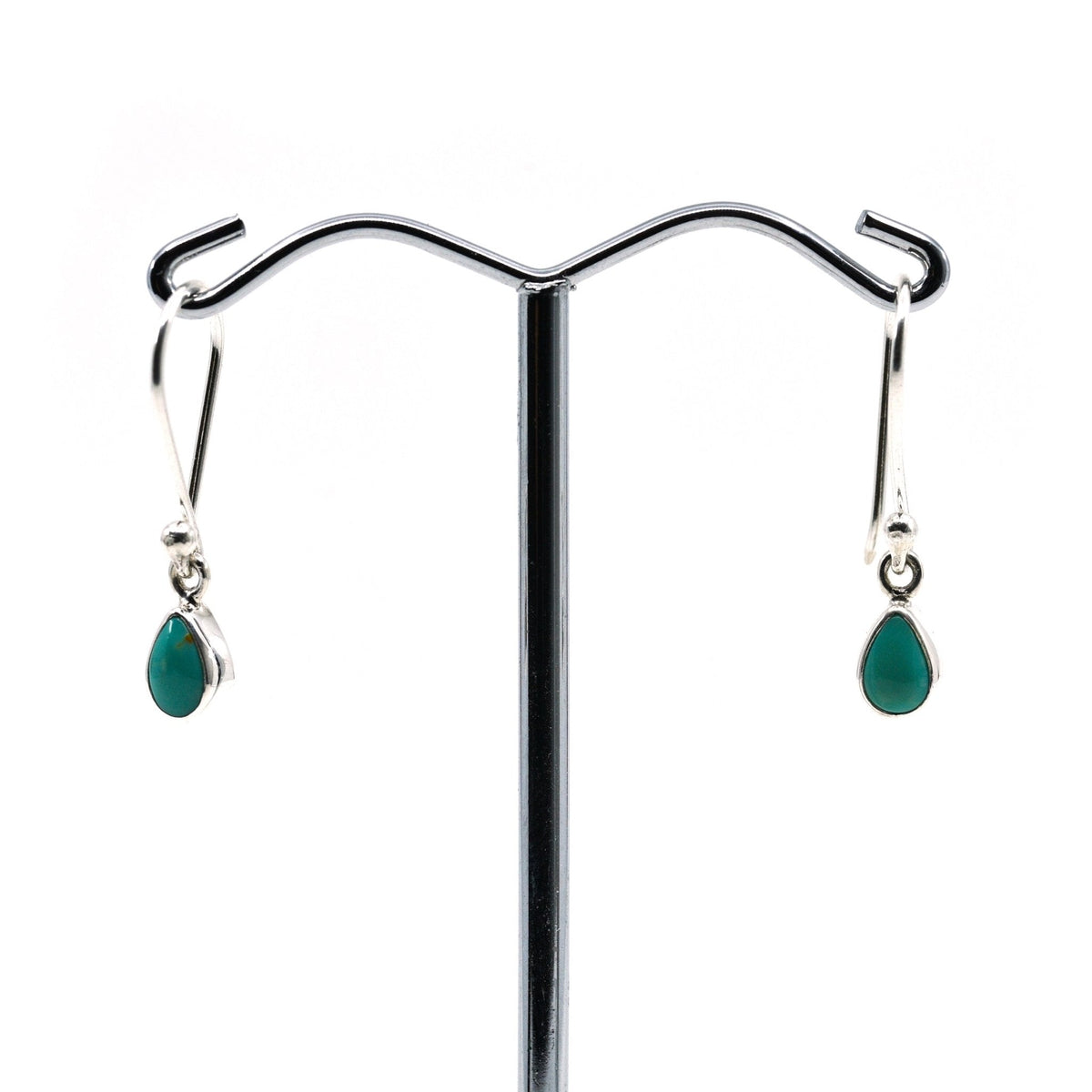 turquoise cabochon teardrop earrings with silver setting on white background — Eternal Spirit