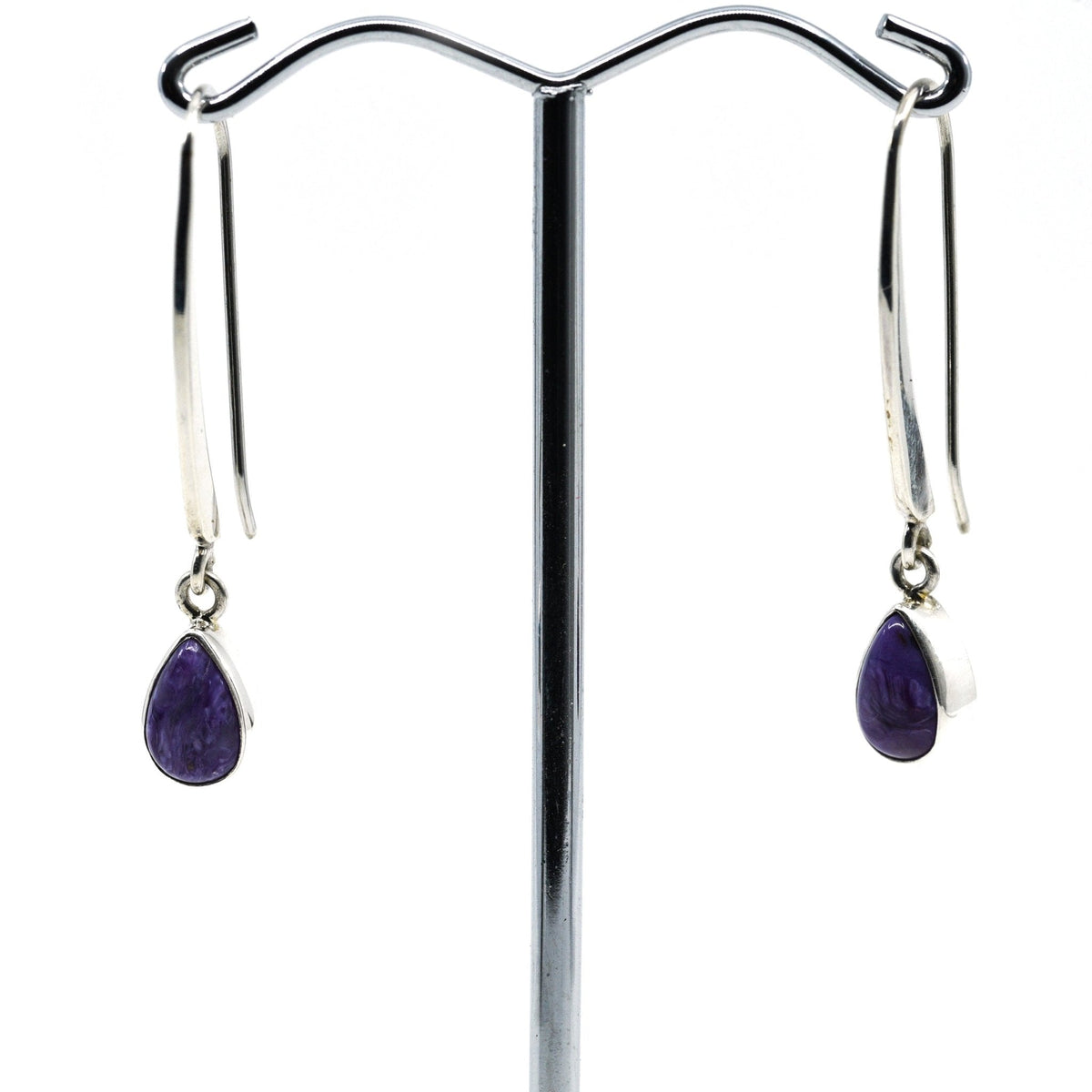 charoite cabochon teardrop earrings in silver setting, white background — Eternal Spirit