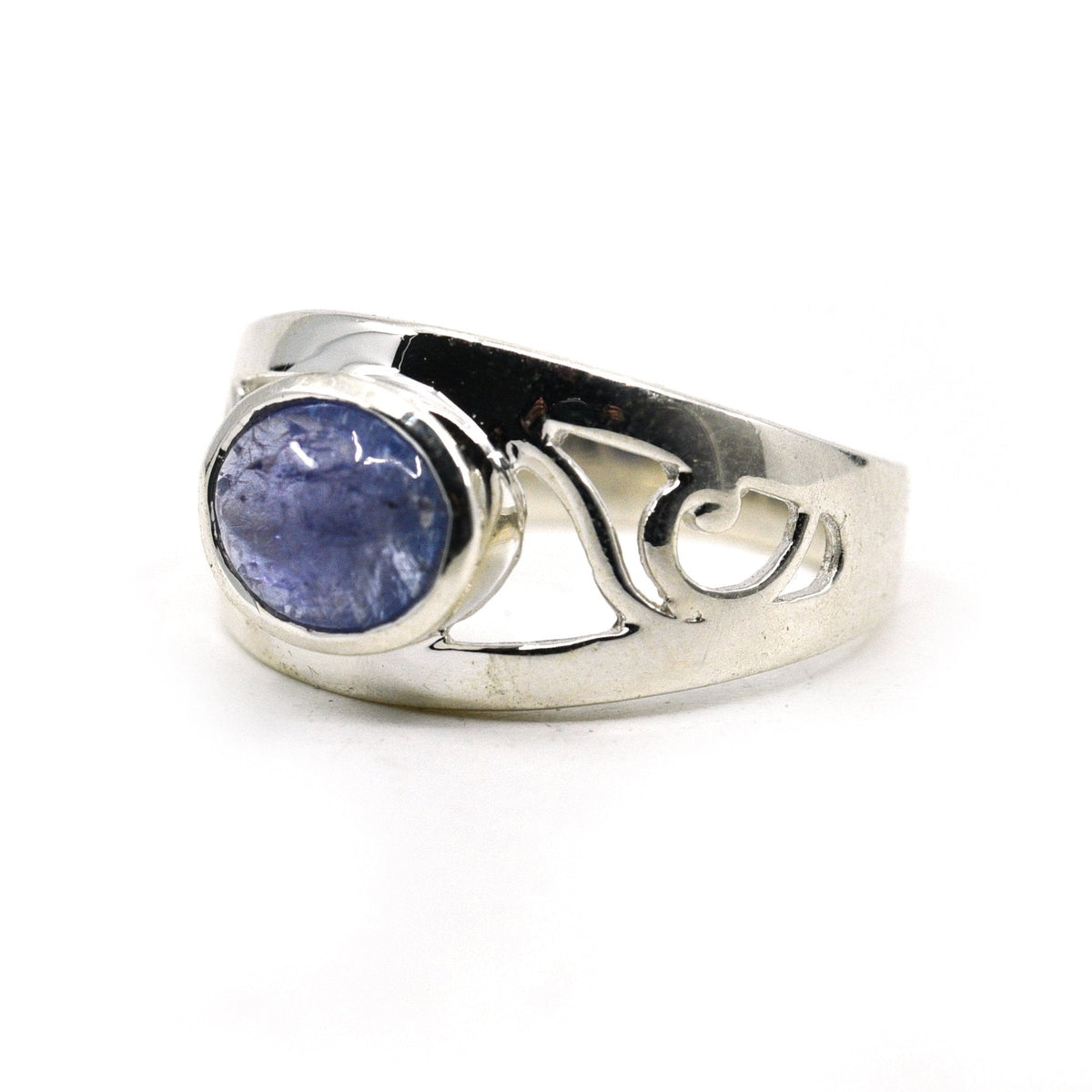 Tanzanite ring #R757 angled to reveal its polished setting and silver band — Eternal Spirit