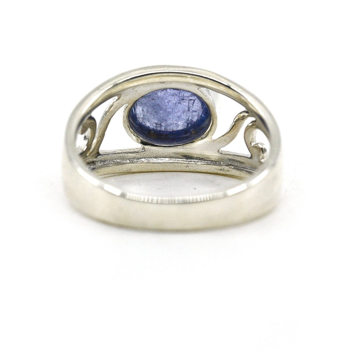 elegant side profile of Tanzanite ring #R757, the gemstone catching light — Eternal Spirit
