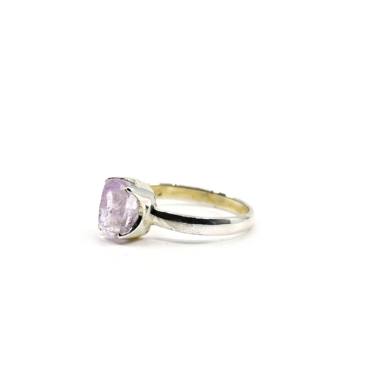 Kunzite ring #R712 angled to reveal its polished setting and silver band — Eternal Spirit