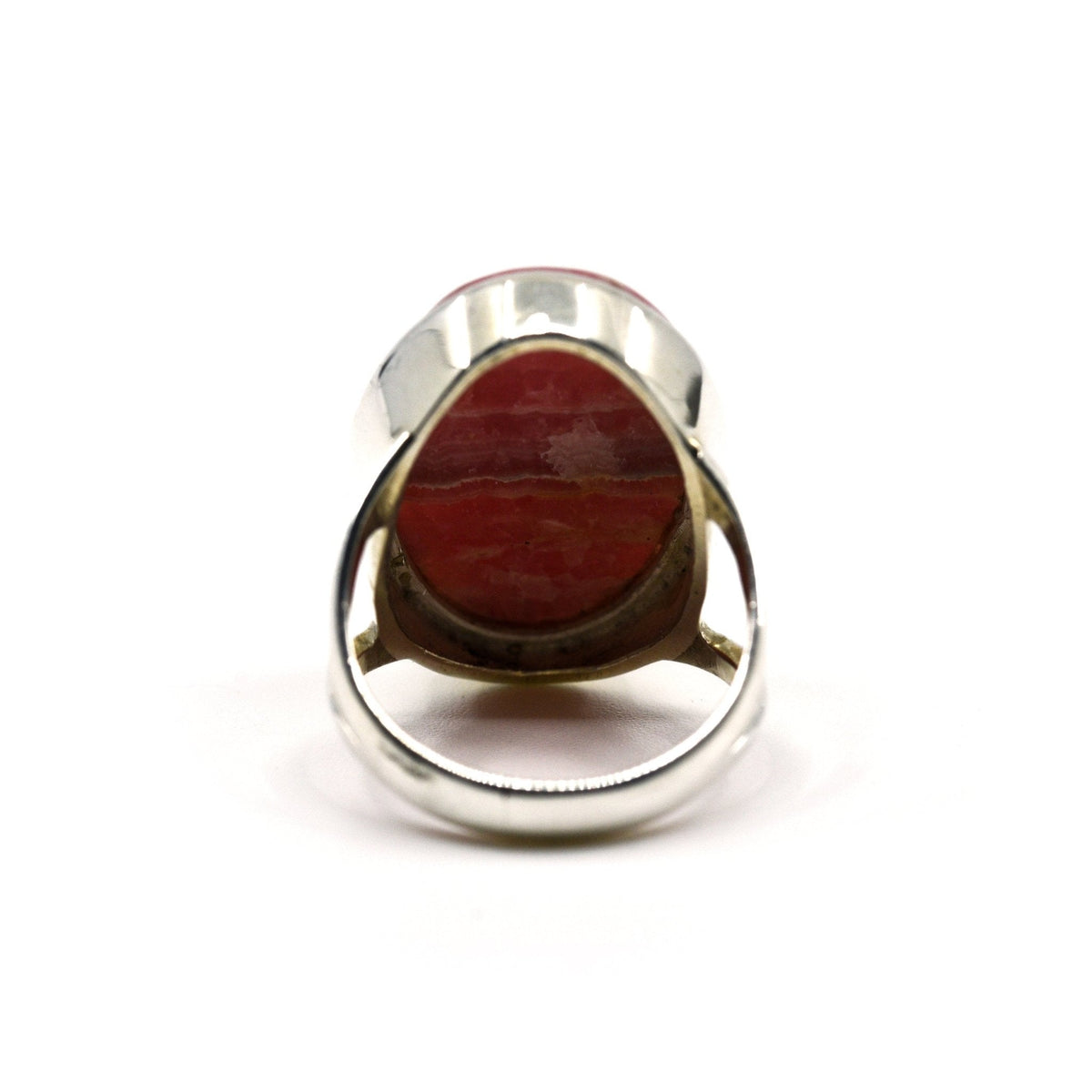 elegant side profile of Rhodocrosite ring #R725, the gemstone catching light — Eternal Spirit