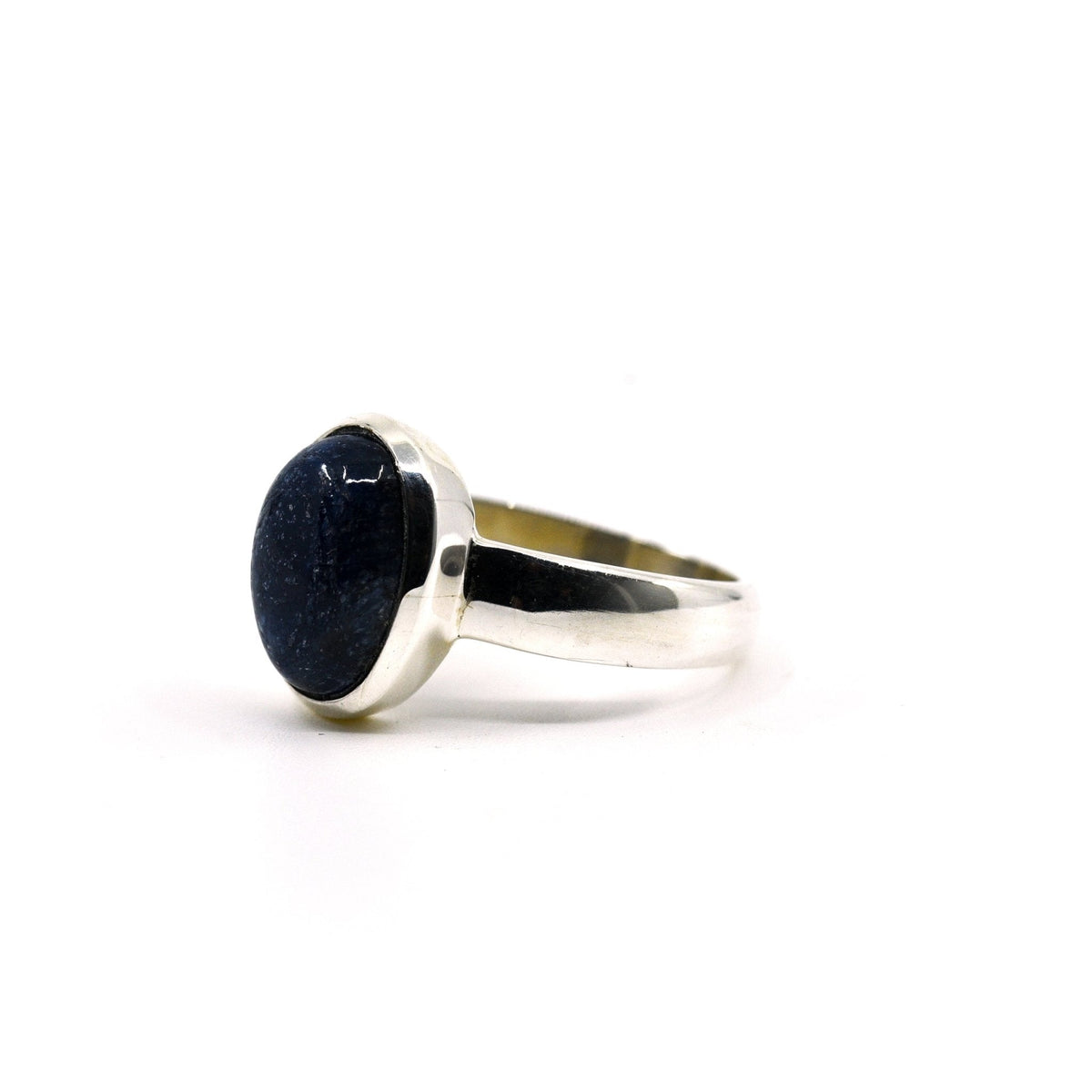 Sapphire (Blue) ring #R727 angled to reveal its polished setting and silver band — Eternal Spirit