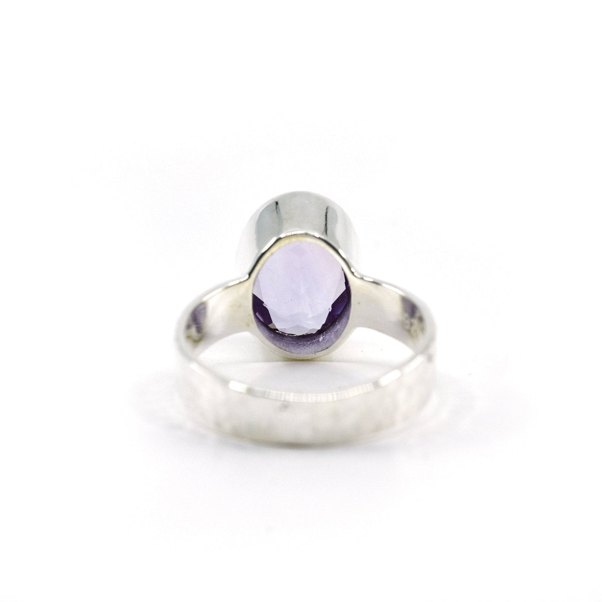 elegant side profile of Amethyst ring #R740, the gemstone catching light — Eternal Spirit