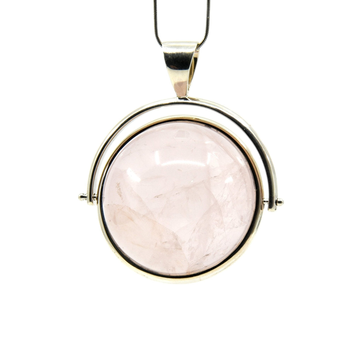 quartz (rose) spinning sphere pendant, angled view showing silver bail and stone profile — Eternal Spirit