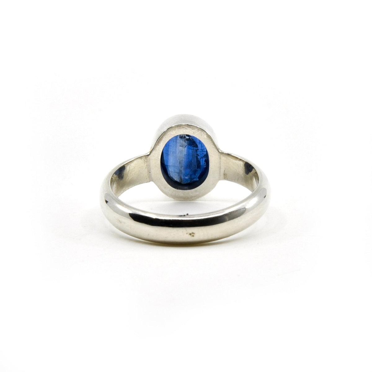 elegant side profile of Kyanite (Blue) ring #R623, the gemstone catching light — Eternal Spirit