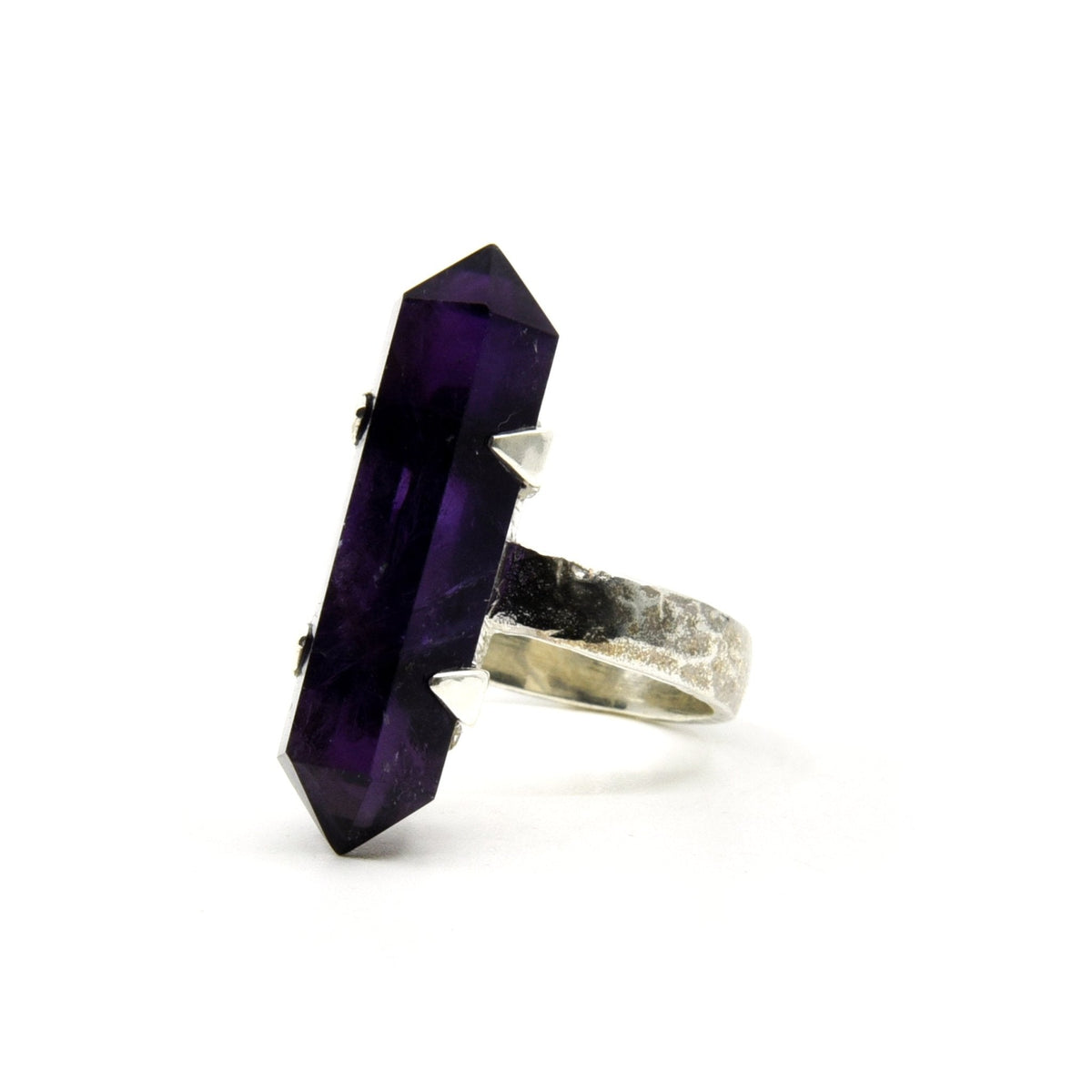 Amethyst ring #R637 angled to reveal its polished setting and silver band — Eternal Spirit