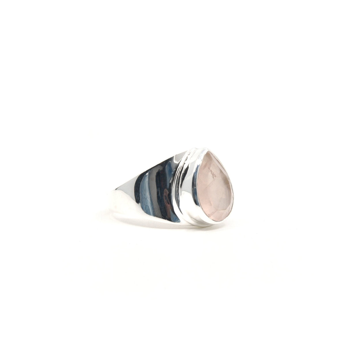 Quartz (Rose) ring #R301 angled to reveal its polished setting and silver band — Eternal Spirit