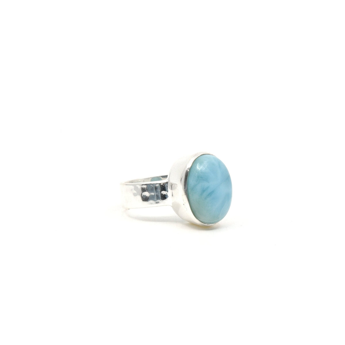 Larimar ring #R314 angled to reveal its polished setting and silver band — Eternal Spirit