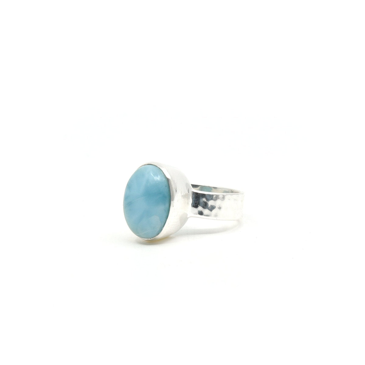 elegant side profile of Larimar ring #R314, the gemstone catching light — Eternal Spirit