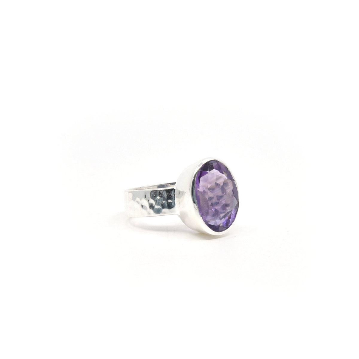Amethyst ring #R318 angled to reveal its polished setting and silver band — Eternal Spirit