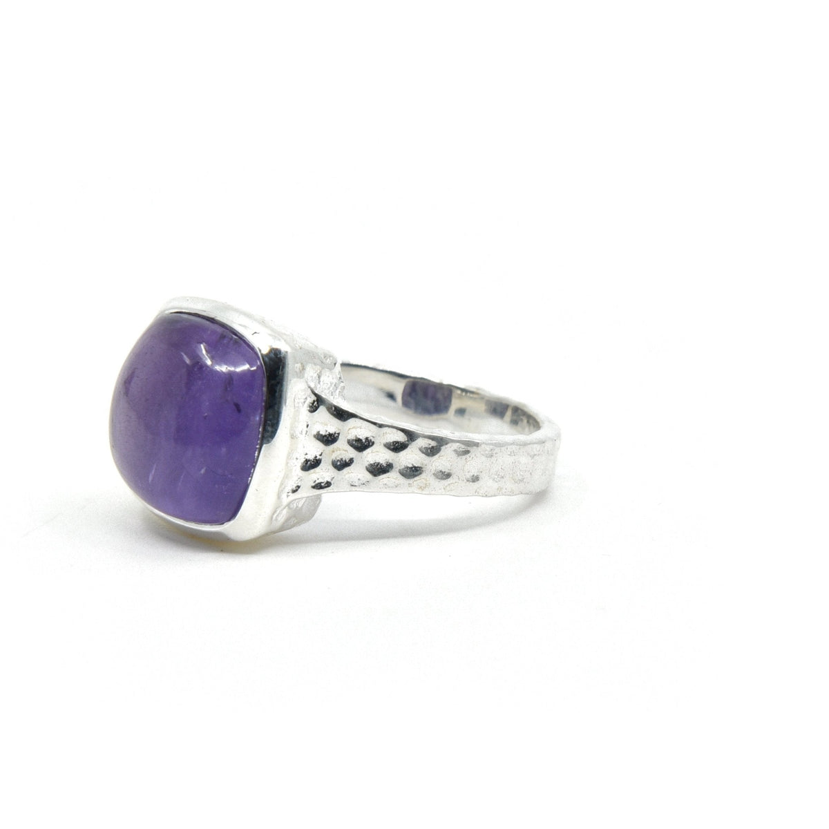 elegant side profile of Amethyst ring #R362, the gemstone catching light — Eternal Spirit