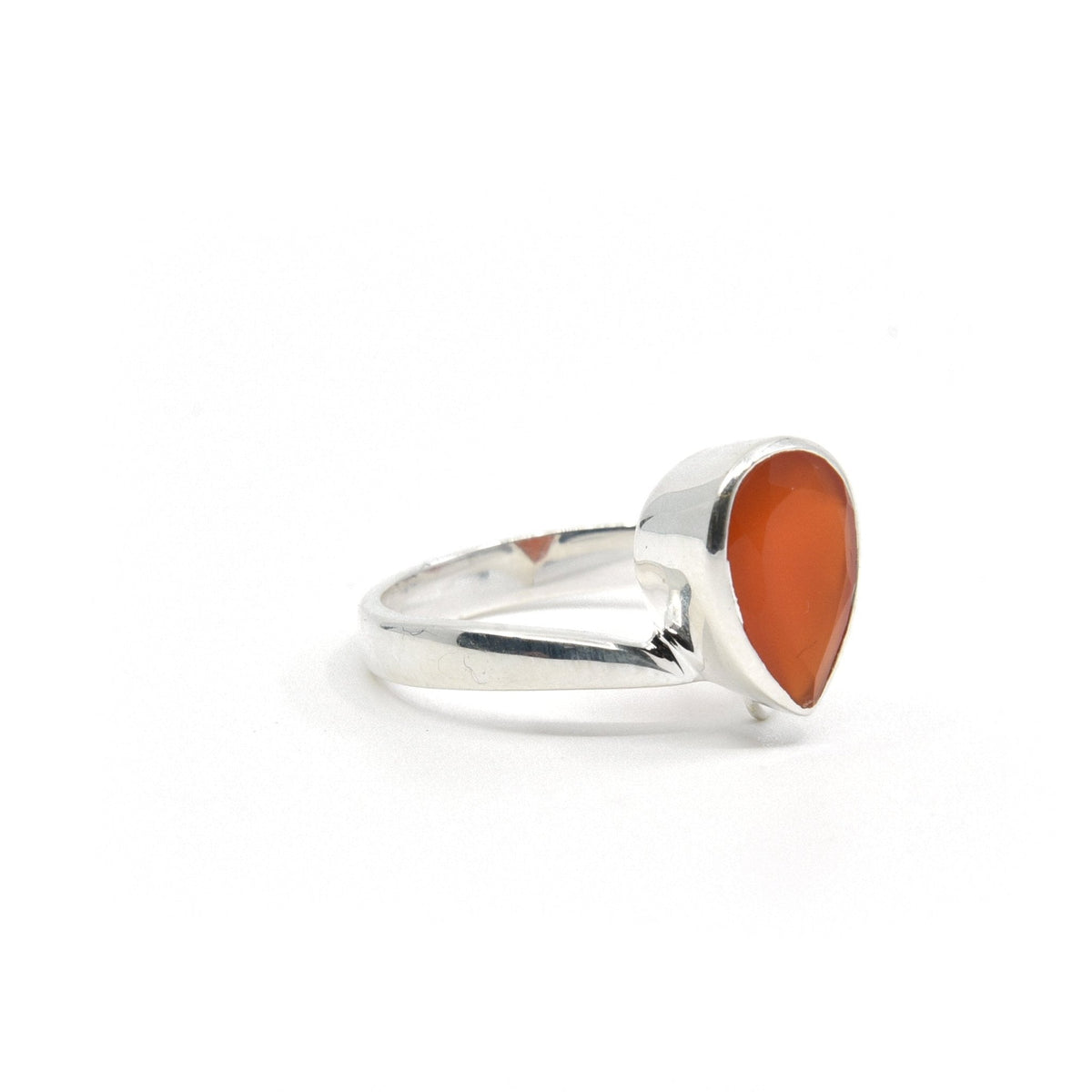 Carnelian ring #R368 angled to reveal its polished setting and silver band — Eternal Spirit