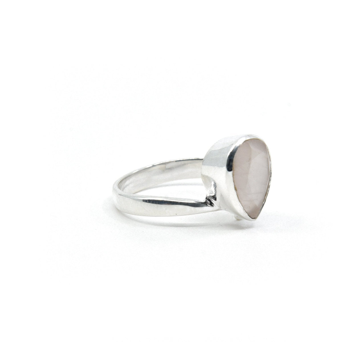 Quartz (Rose) ring #R371 angled to reveal its polished setting and silver band — Eternal Spirit