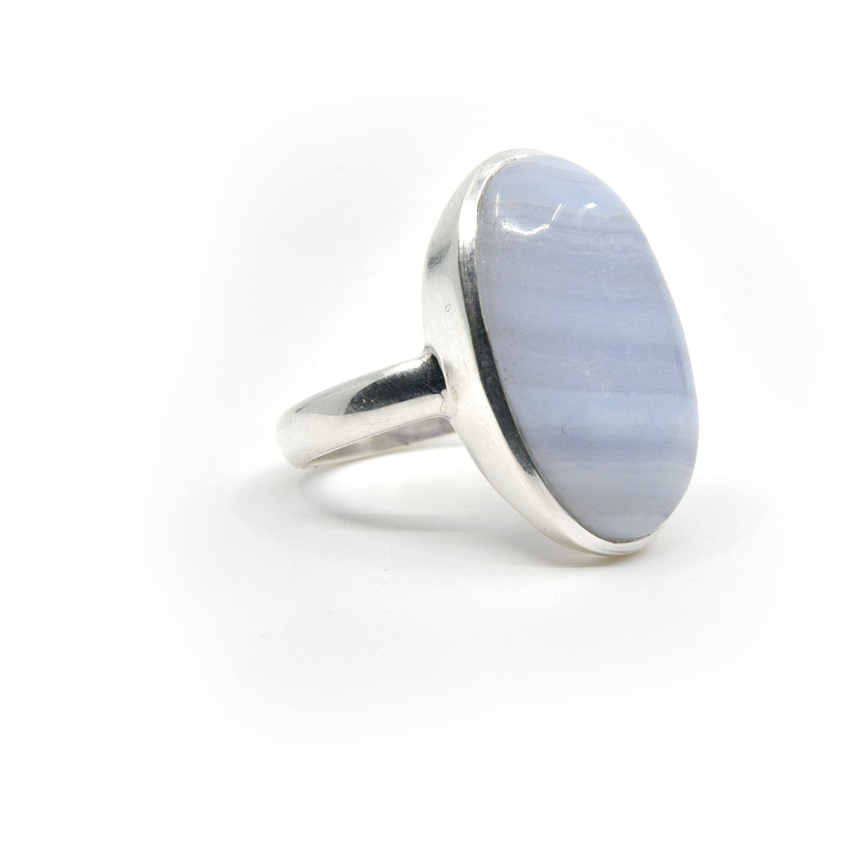 Agate (Blue Lace) ring #R410 angled to reveal its polished setting and silver band — Eternal Spirit