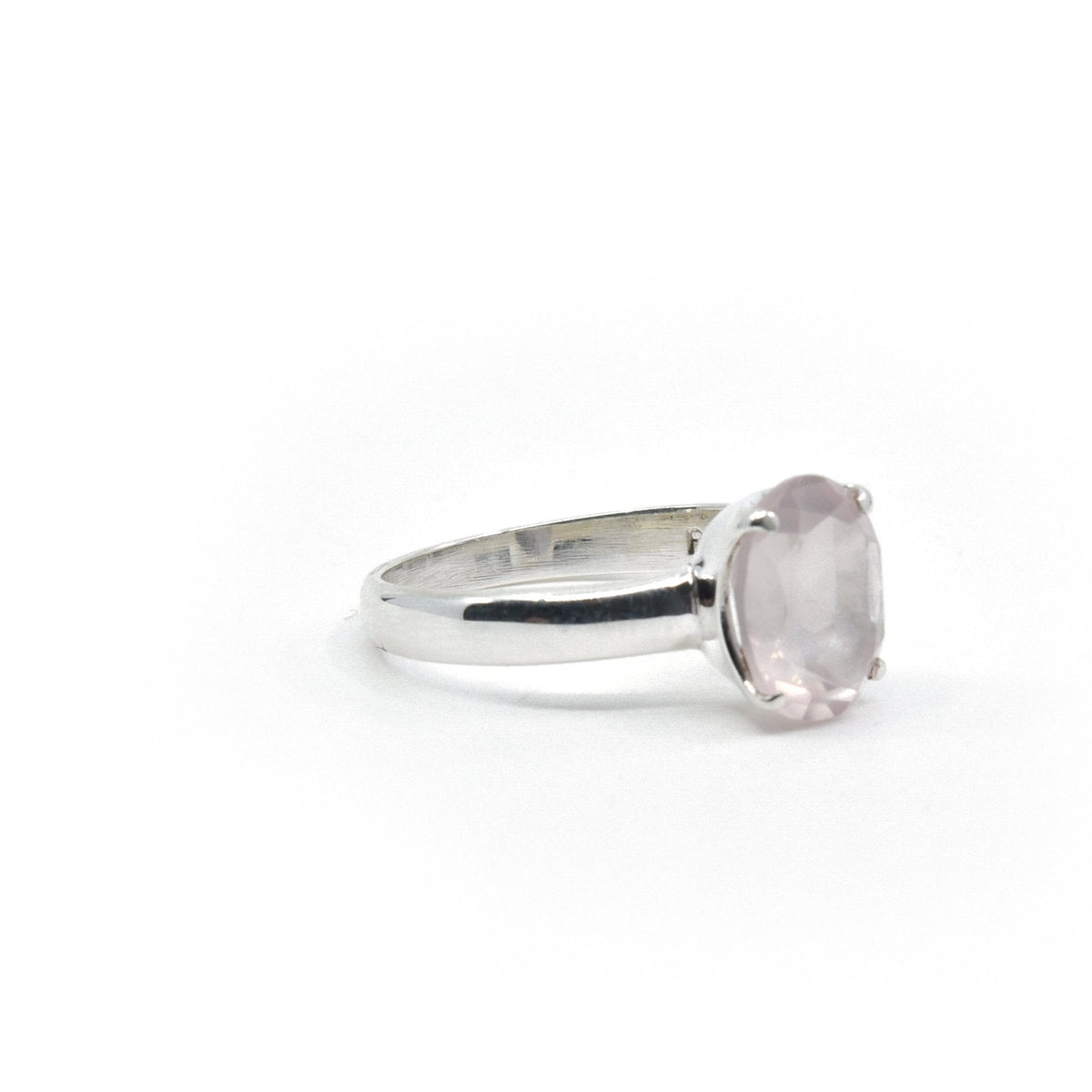 Quartz (Rose) ring #R417 angled to reveal its polished setting and silver band — Eternal Spirit