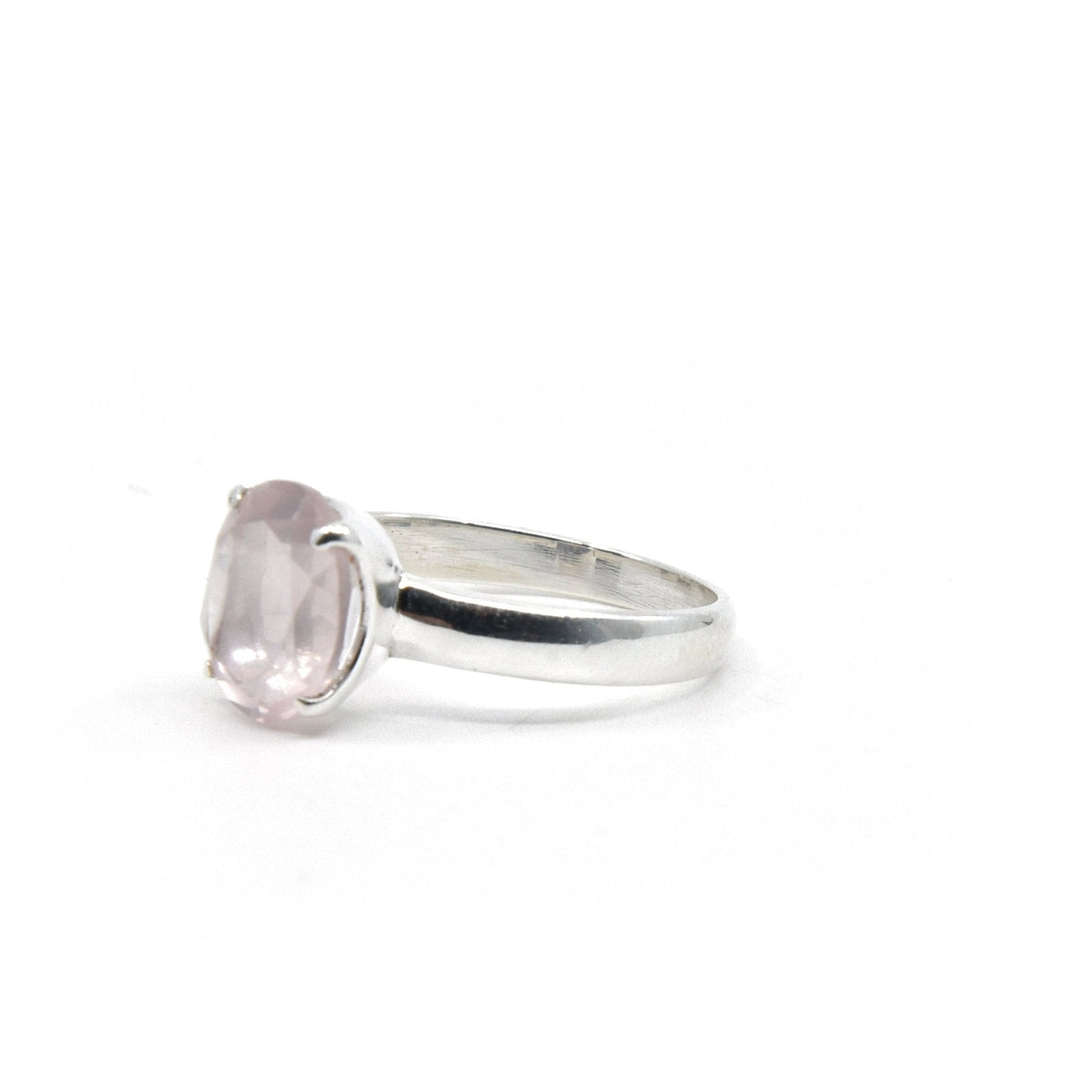 elegant side profile of Quartz (Rose) ring #R417, the gemstone catching light — Eternal Spirit