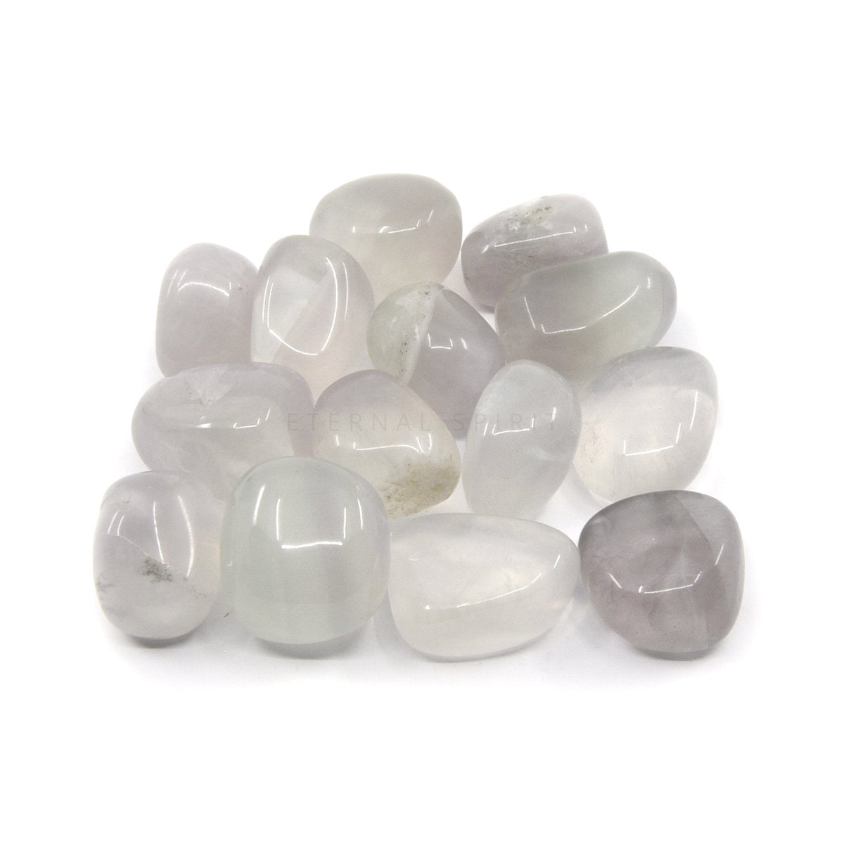 collection of polished Fluorite (Pink) tumble stones — Eternal Spirit