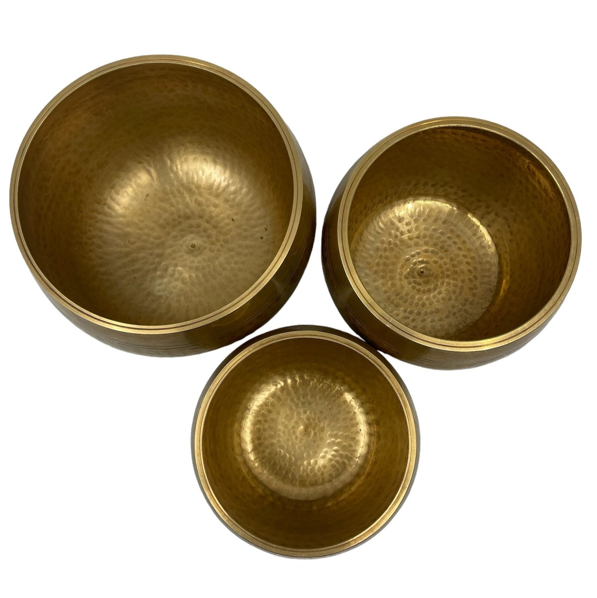 Yellow Hammered Madal Base chakra bowl (13.5cm) from a second angle — Eternal Spirit