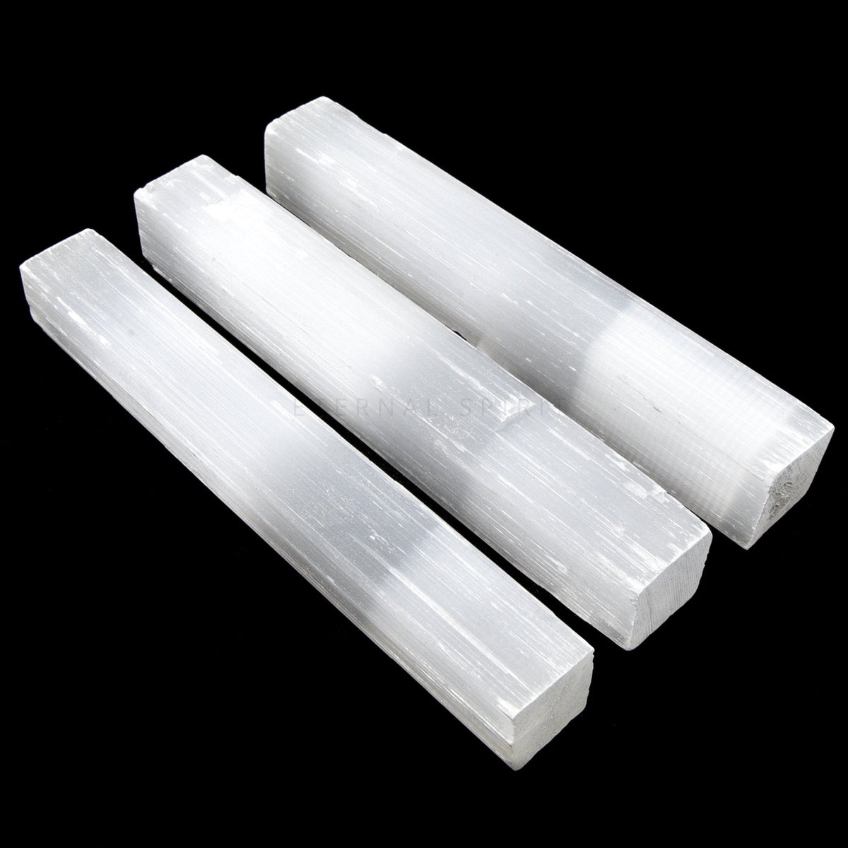 luminous white Selenite polished rod, macro view of crystal structure — Eternal Spirit