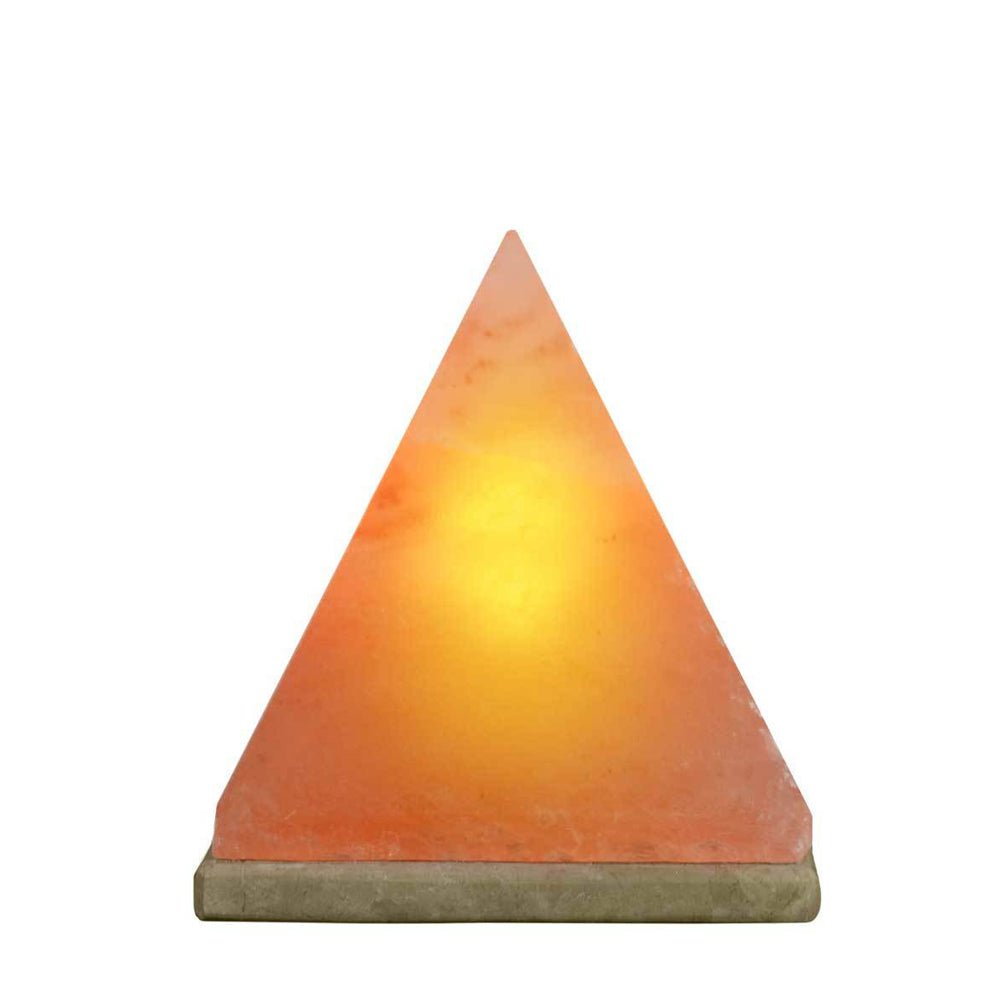 Himalayan salt lamp , warm amber glow on wooden base — Eternal Spirit