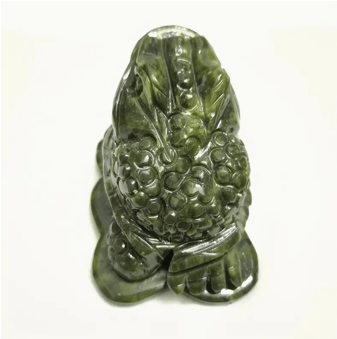 Carved Jade money frog, close-up of natural texture — Eternal Spirit