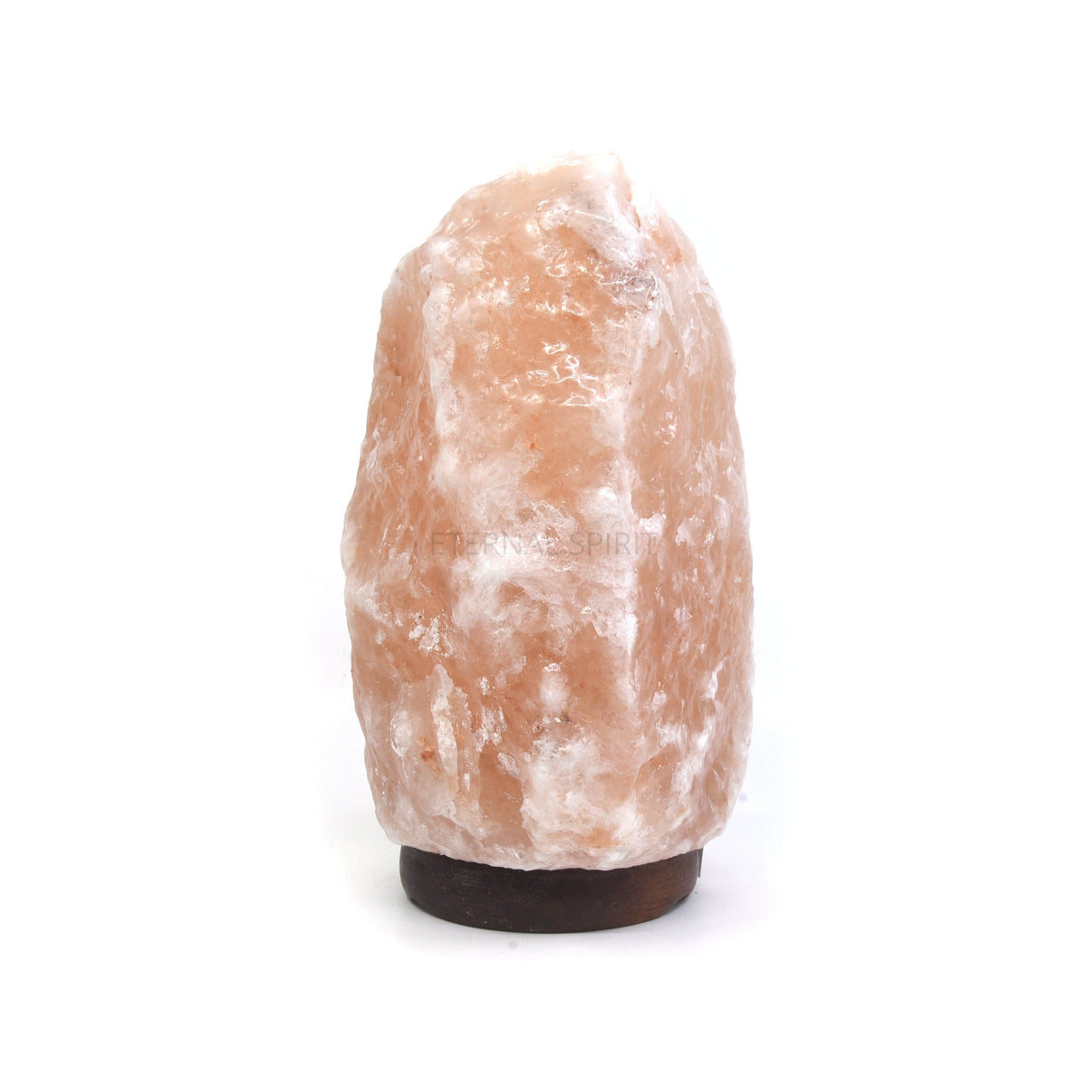 Himalayan salt lamp 5.5kg, warm amber glow on wooden base — Eternal Spirit