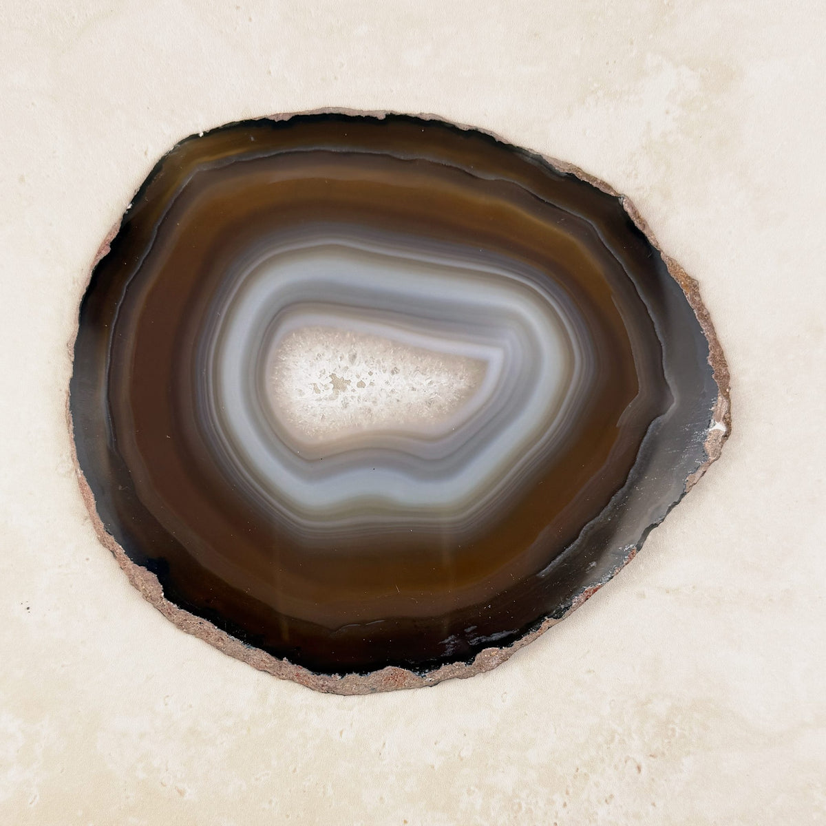 Agate crystal slice 14.5cm, natural brown and cream bands around a white centre, from above — Eternal Spirit