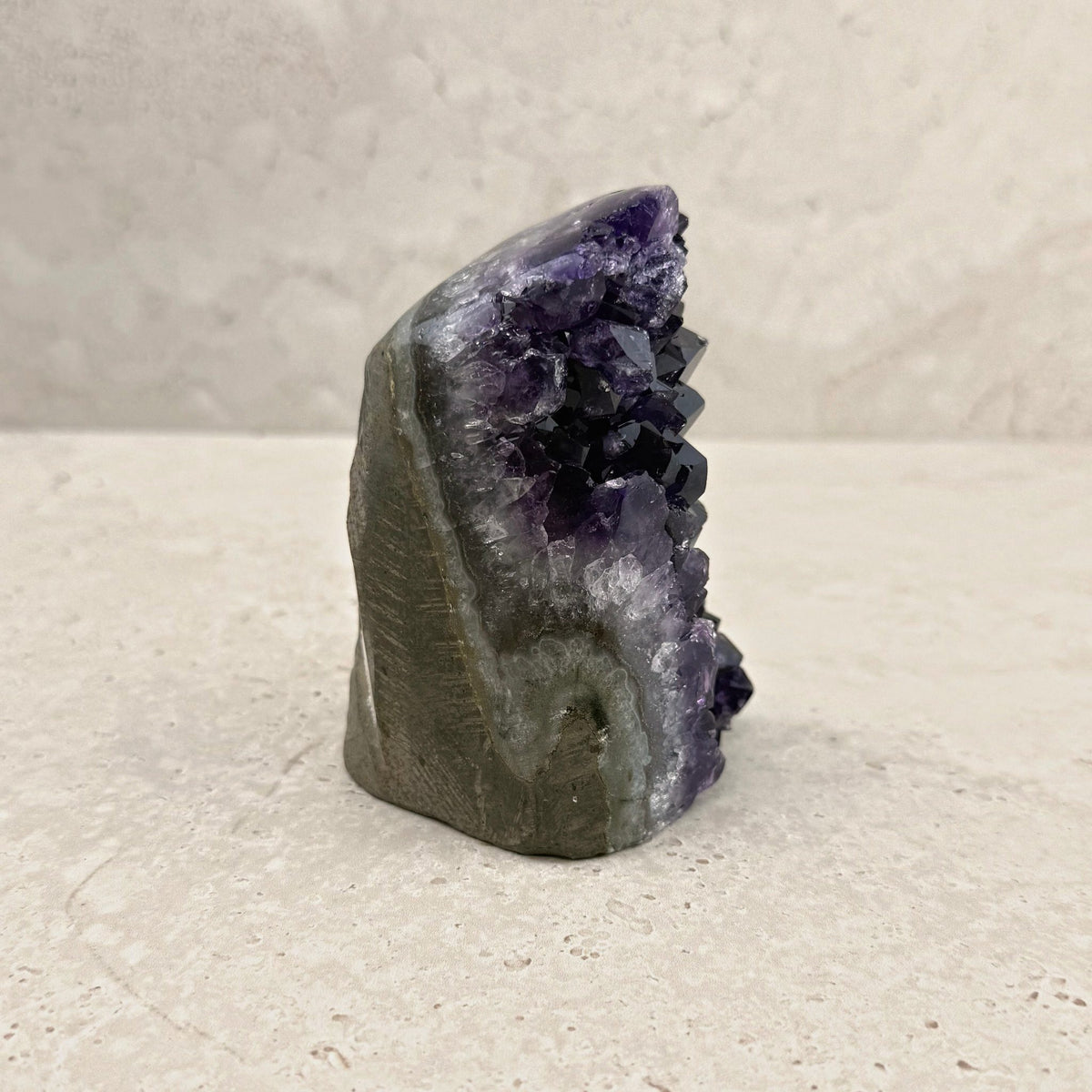Base cut amethyst crystal 10.5cm, lavender band along the edge, side view — Eternal Spirit