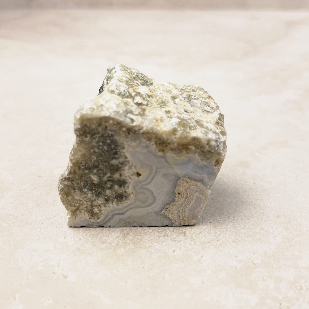 Blue lace agate rough crystal 5cm, pale blue-grey bands under a cream crust, front view — Eternal Spirit