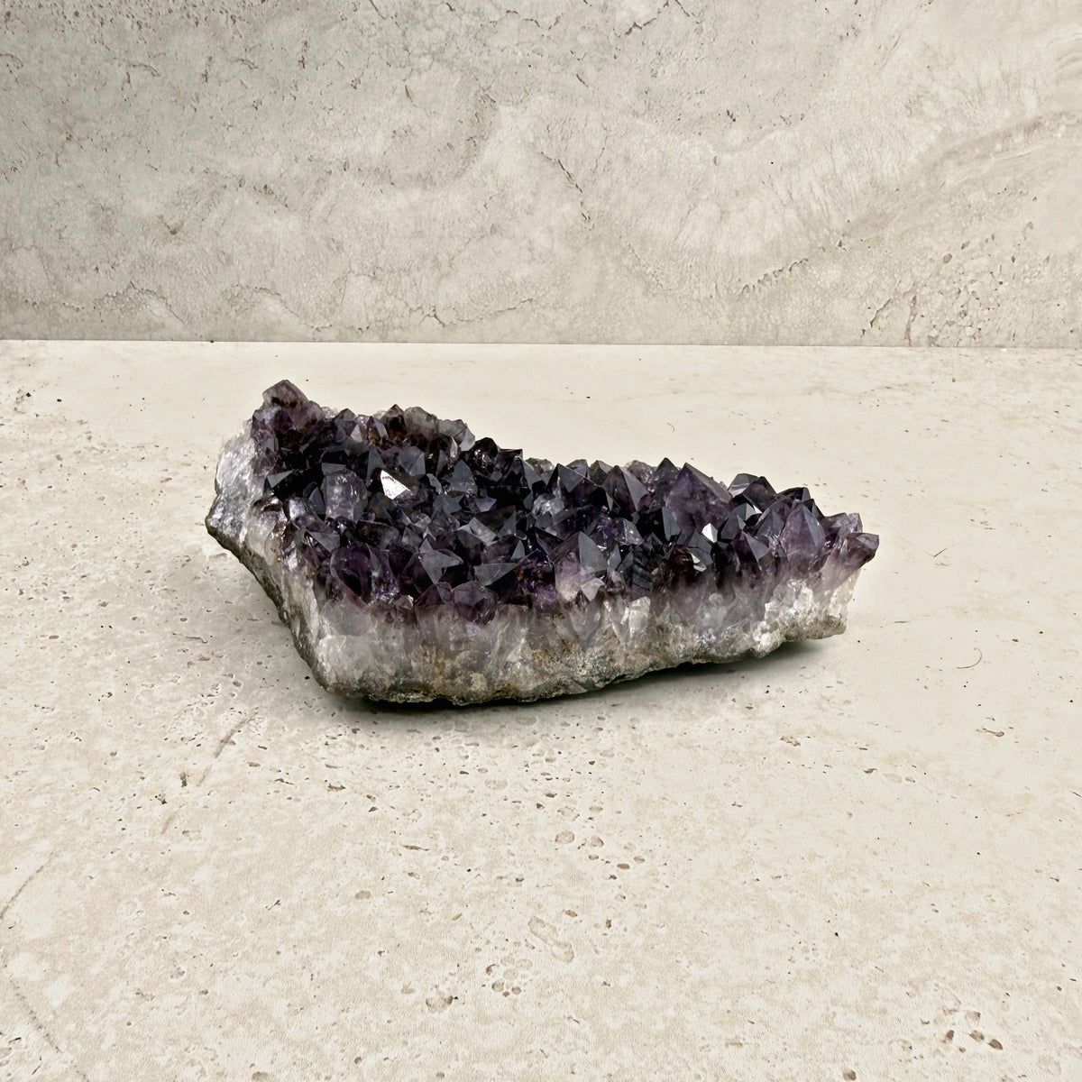 Amethyst crystal cluster 16cm, low flat cluster of very dark purple crystals, side view — Eternal Spirit