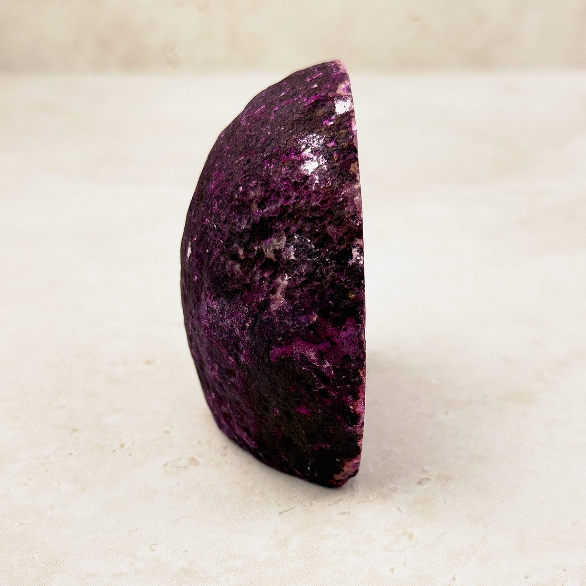 Dyed pink agate crystal geode 7.5cm, textured deep pink outer rind, side view — Eternal Spirit