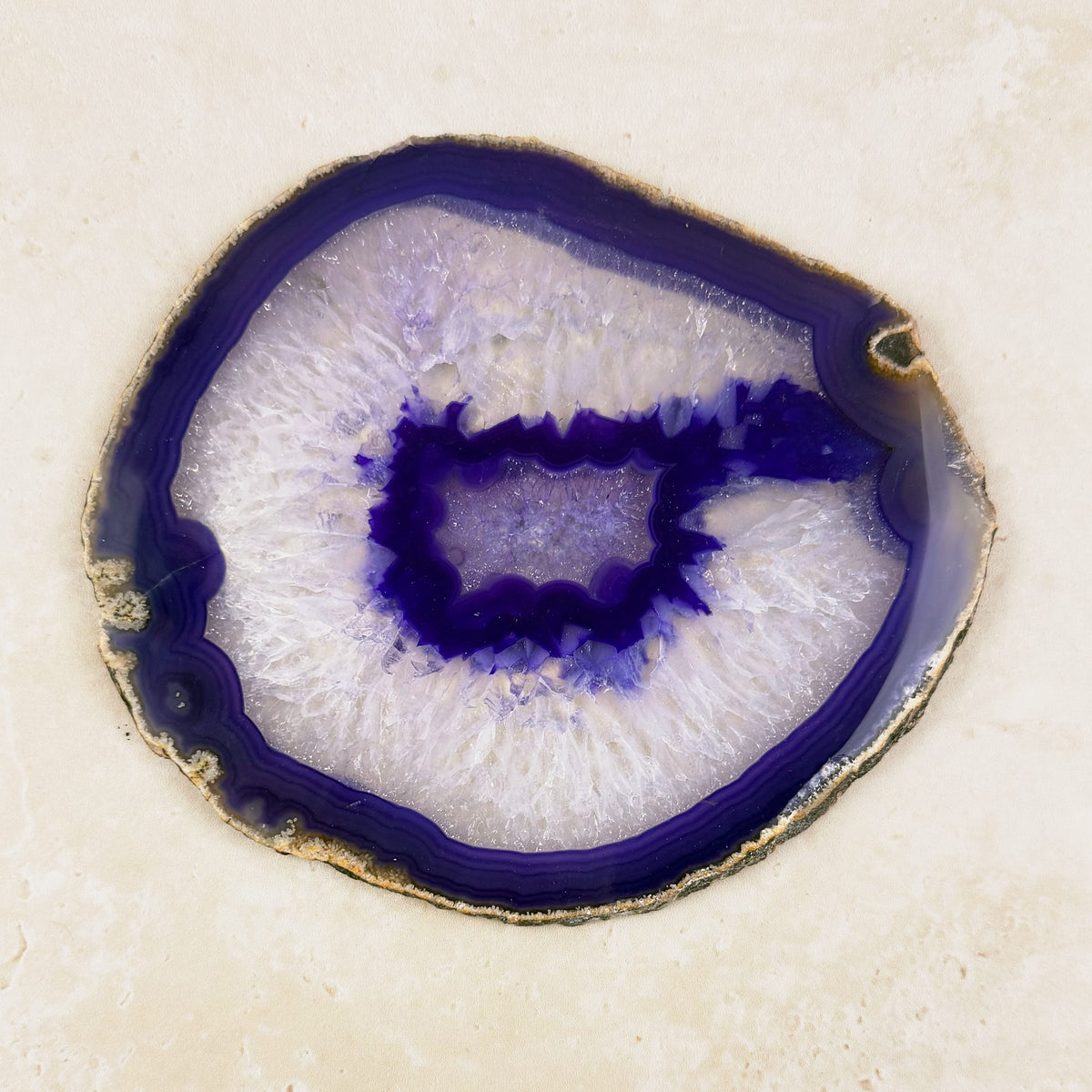 Dyed purple agate crystal slice 14cm, white crystal centre with a purple ring, viewed from above — Eternal Spirit
