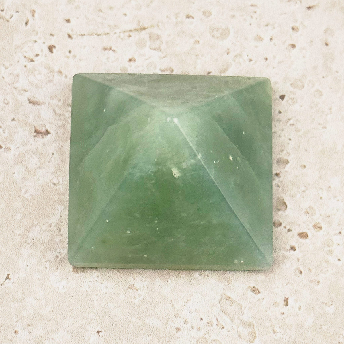 Green aventurine crystal pyramid 4cm, its four faces seen from above — Eternal Spirit