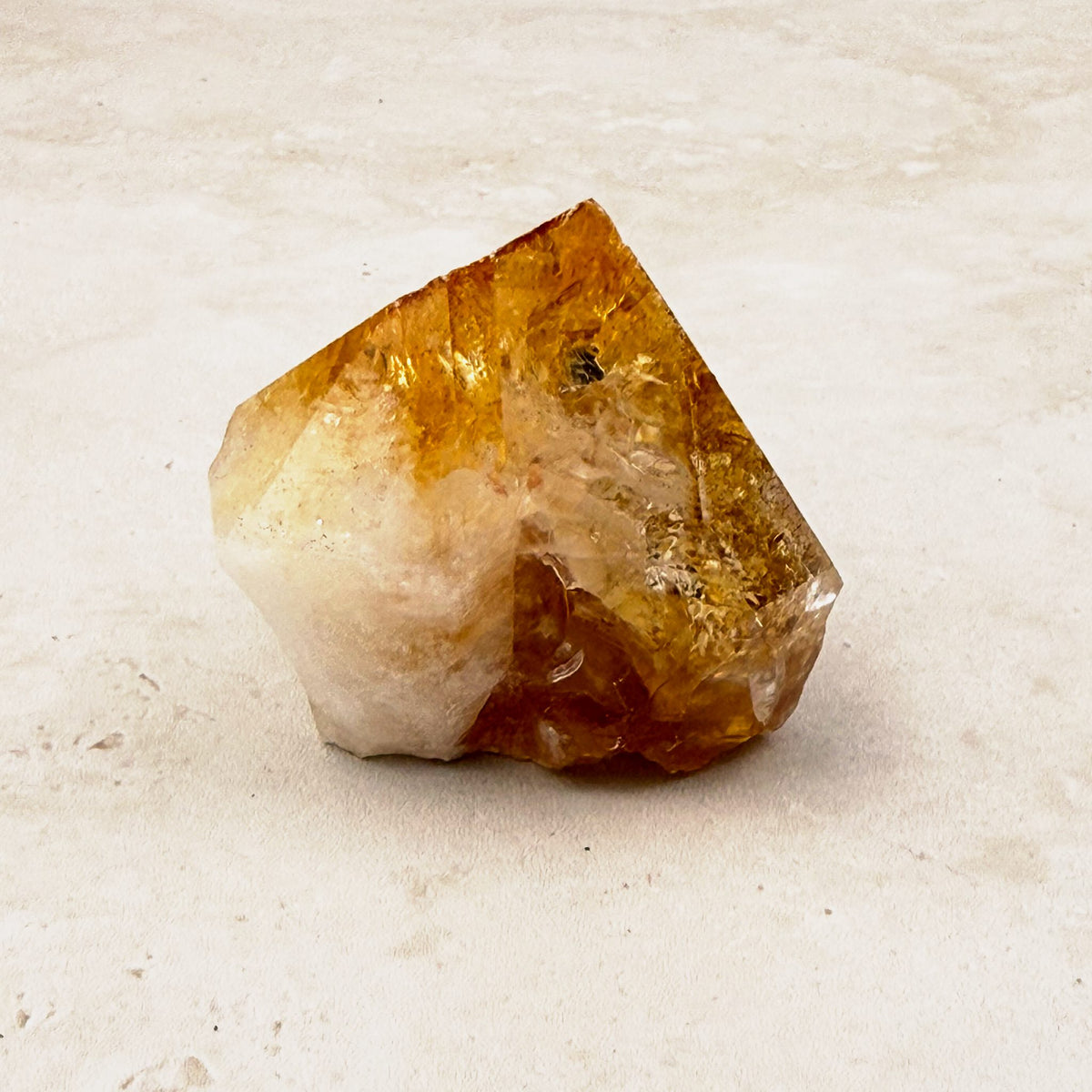 Heated citrine base cut crystal 5cm, single amber point with a white base, front view — Eternal Spirit