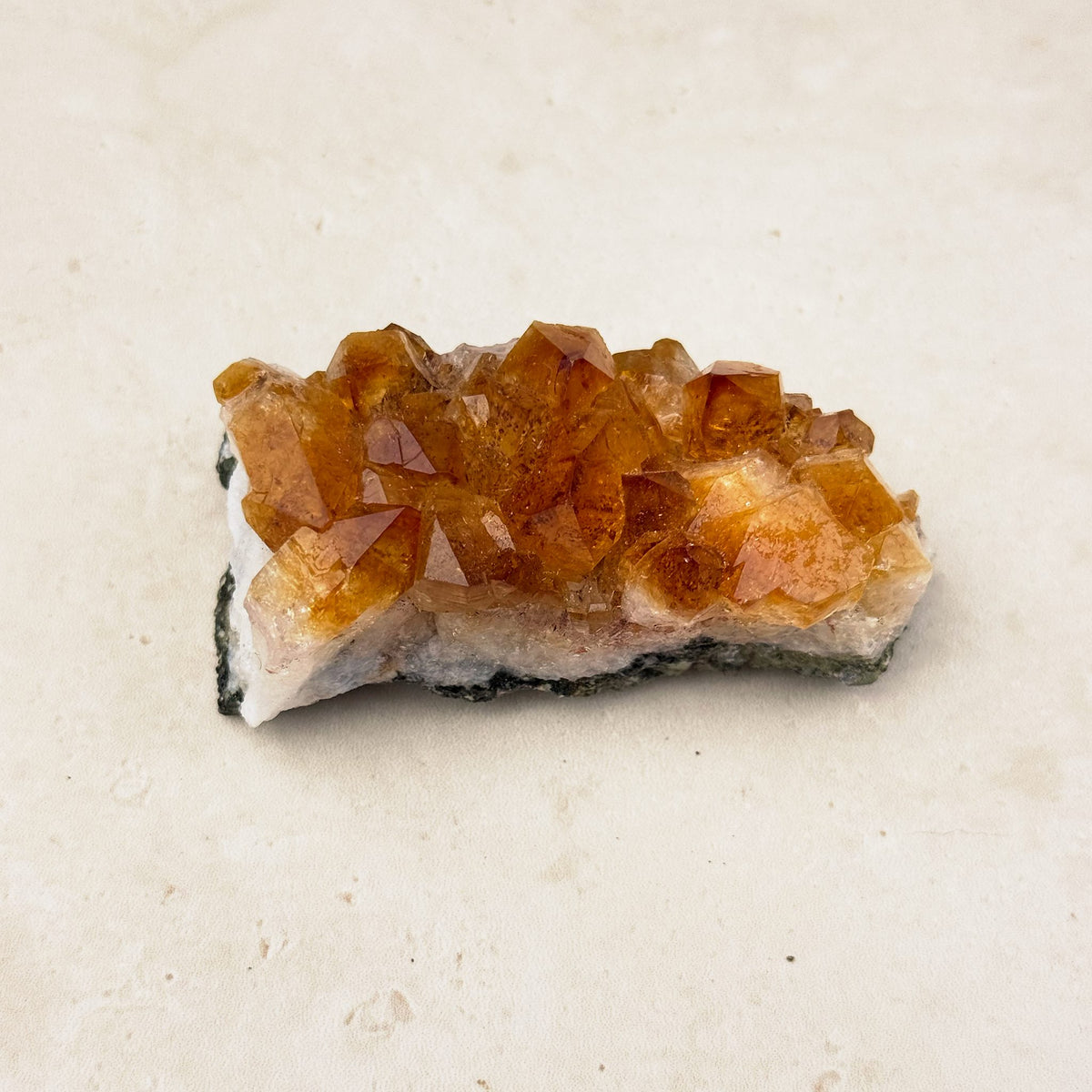 Heated citrine crystal cluster 7.5cm, amber points along a white quartz base, side view — Eternal Spirit